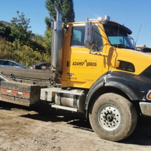 2010 Sterling Tandem Axle Roll Off Truck